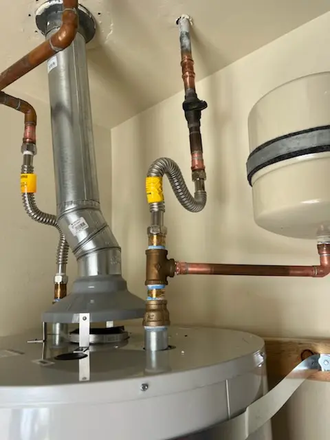 Water heater installation and plumbing repair in Amsbry